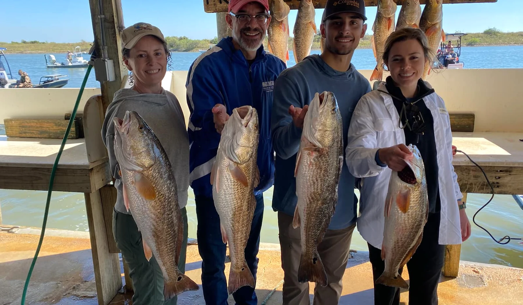 Family and friends displaying their catch after a Port O’Connor trip